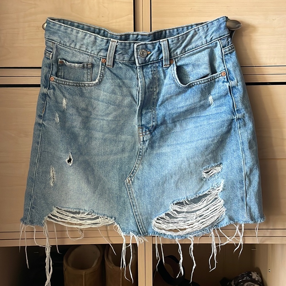 Denim distressed jean skirt